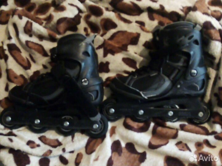 Роликовые коньки