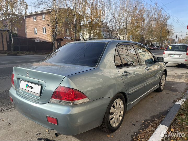 Mitsubishi Lancer 1.6 МТ, 2006, 230 000 км