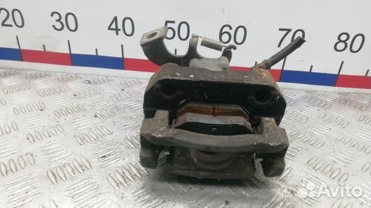 Суппорт тормозной задний левый toyota corolla E15