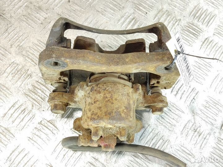 Суппорт передний правый Mitsubishi Lancer 9