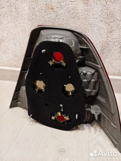 Фонарь задний левый от Toyota Corolla 120