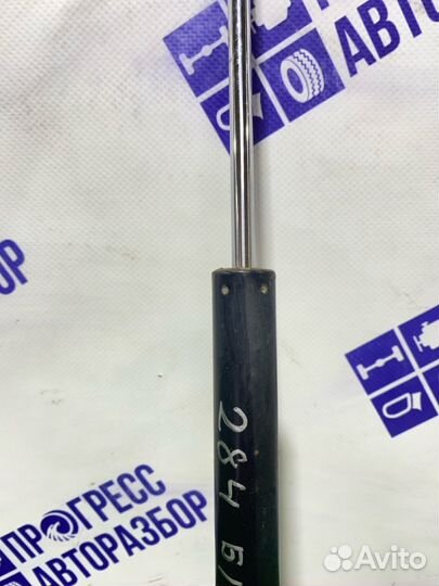 Амортизатор багажника задний правый Nissan Tiida