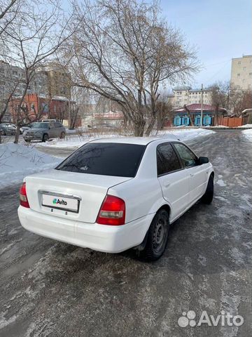 Mazda Familia 1.3 AT, 2002, 250 000 км