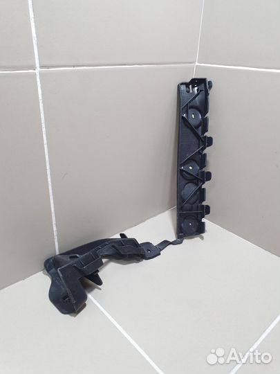 Кронштейн бампера задний левый Opel Astra J