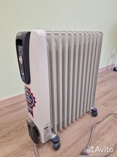 Масляный радиатор Delonghi