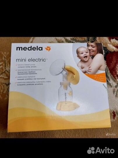 Молокоотсос medela электрический