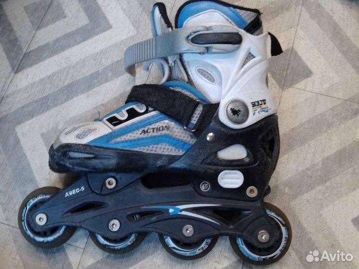 Роликовые коньки