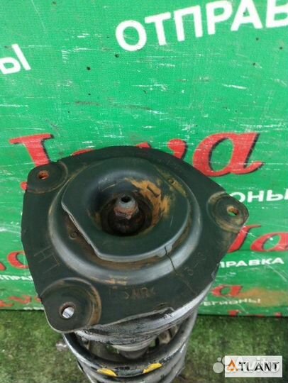 Стойка передняя левая nissan note