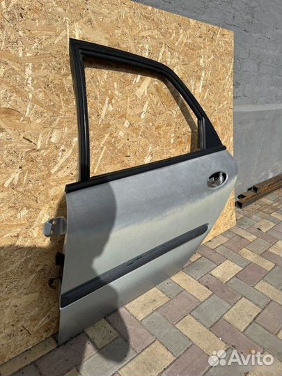 Дверь задняя левая Renault Laguna 2.0