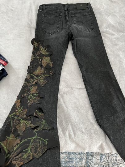 Джинсы Versace