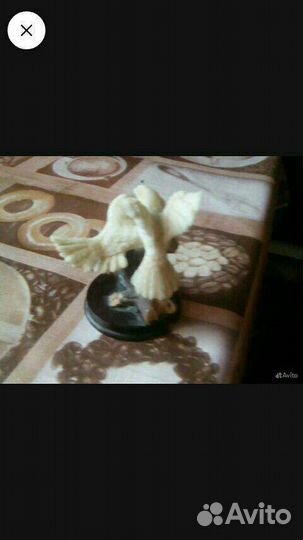 Статуэтка птицы