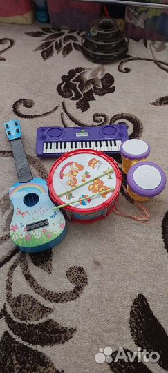 Игрушки:музыкальные инструменты