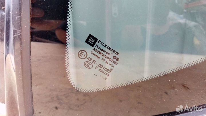 Стекло заднее левое глухое на Опель Астра Джей