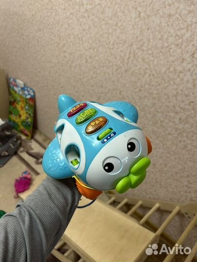 Самолет сортер-каталка для ребенка музыкальнКкак