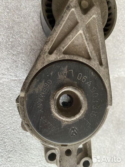 Натяжитель ремня Volkswagen