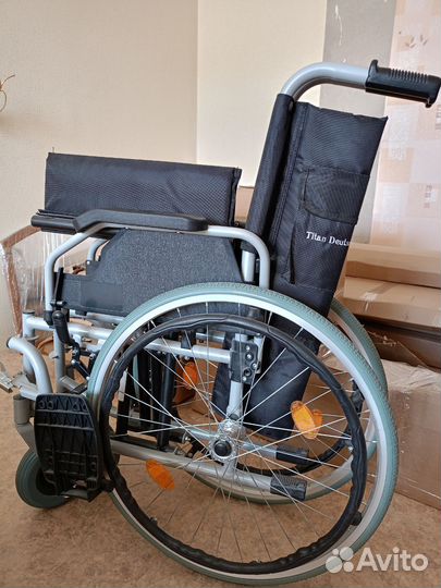Инвалидная коляска