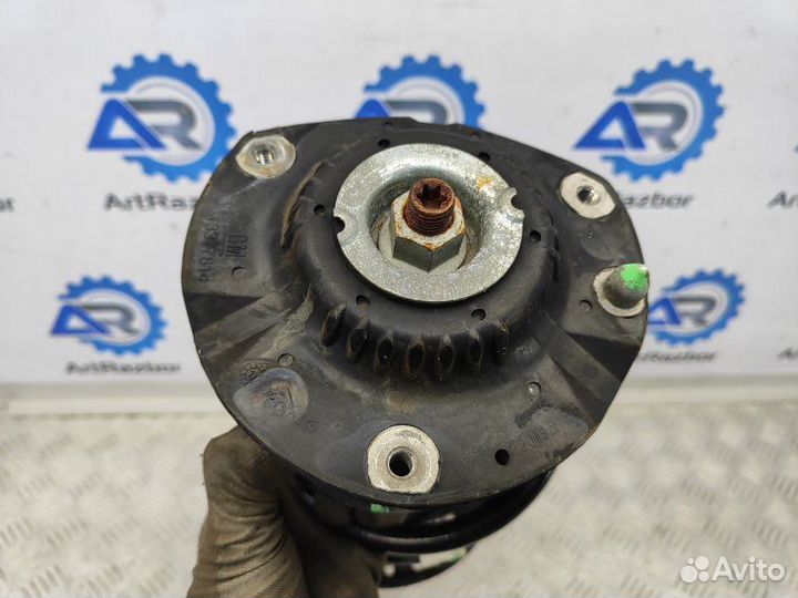 Амортизатор передний левый Chevrolet Cruze J400