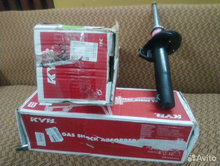 Стойка амортизатора передняя