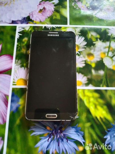 Телефон Samsung SM-N9005