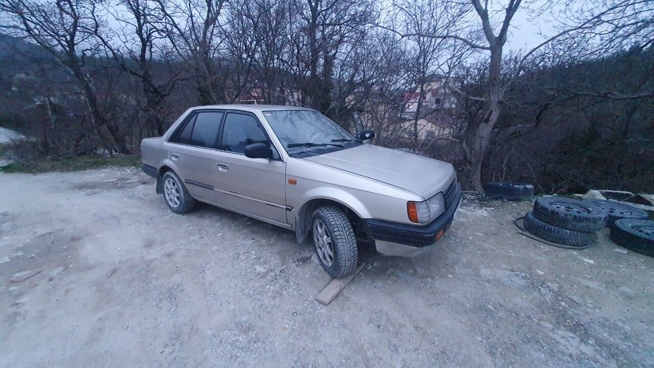 Mazda 323: фото владельца