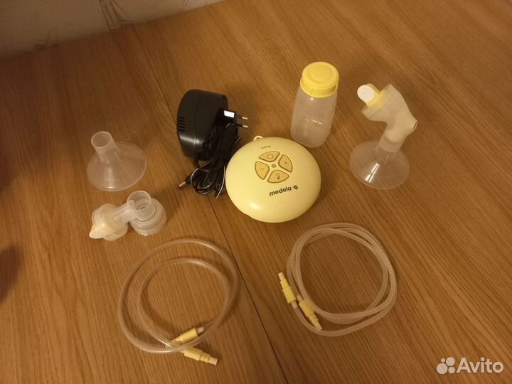 Молокоотсос medela swing электрический