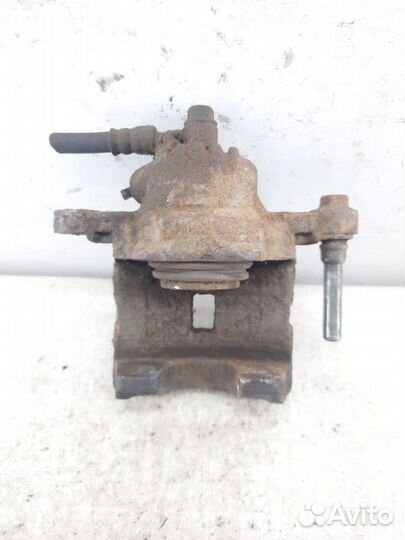 Суппорт тормозной задний левый Kia Sorento