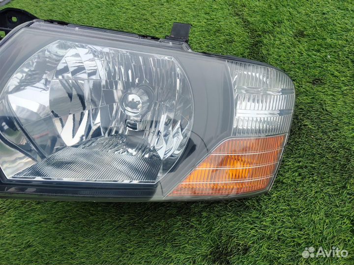 Фара левая Mitsubishi Pajero V75W 6G74 2002