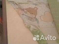 Детская кроватка с маятником