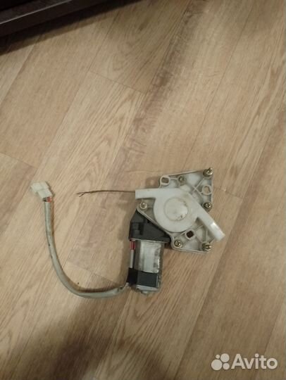 Моторчик стеклоподъемника Lifan breez