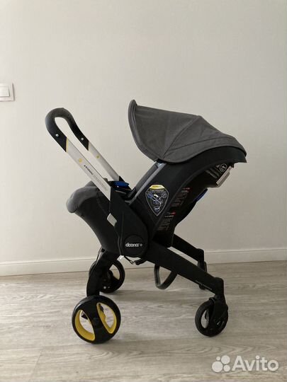 Детское автокресло коляска Doona Plus