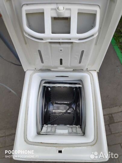 Стиральная машина Канди вертикальной загрузки 7 кг