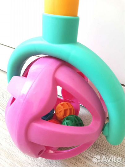 Игрушка каталка с ручкой