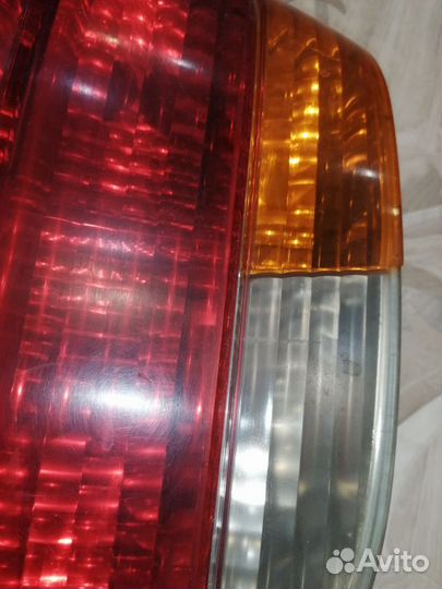Фонарь задний левый Бмв е38