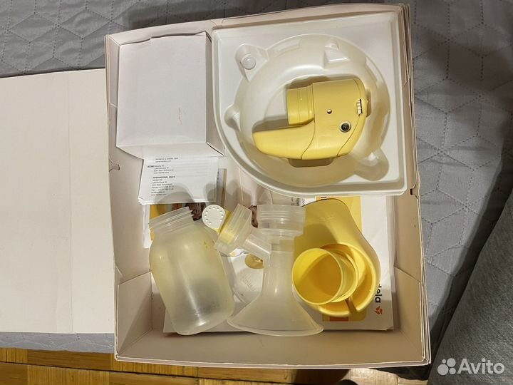 Молокоотсос medela mini electric