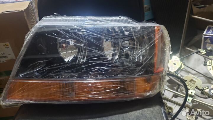 Фара левая Grand Cherokee Laredo (WJ, WG) 99 - 04г