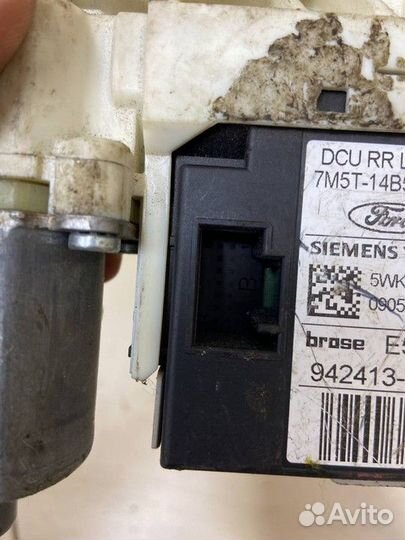 Моторчик стеклоподъемника задний левый Ford Focus