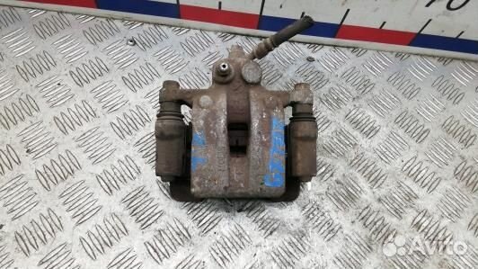 Суппорт тормозной задний левый KIA sportage 3 (2BL