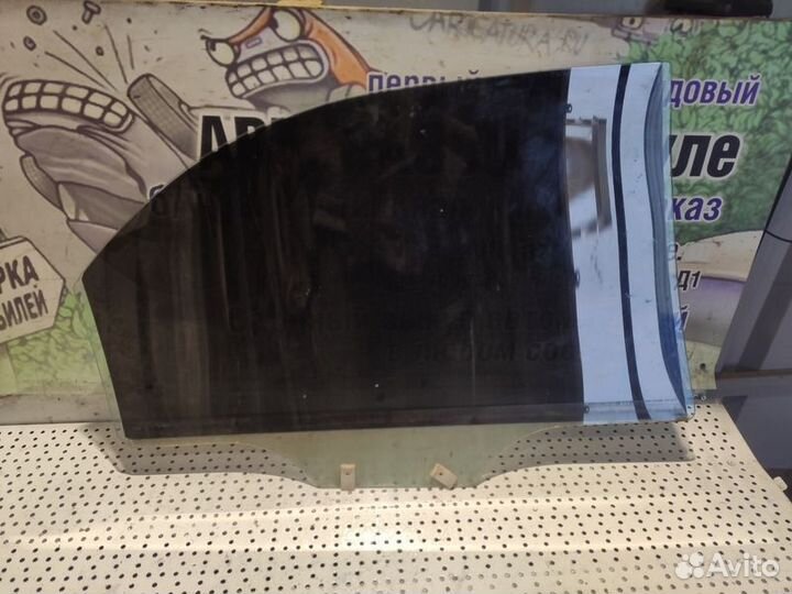 Стекло двери задней левой Kia Spectra