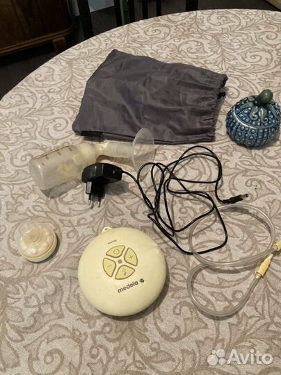 Молокоотсос medela