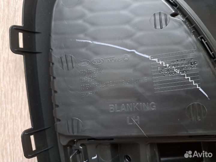 Заглушка бампера передняя левая