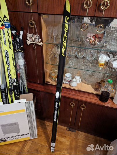 Беговые лыжи и ботинки Fischer