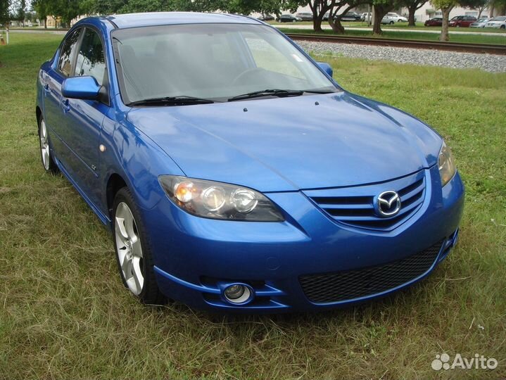 Лобовое стекло на Mazda 3 03-09г