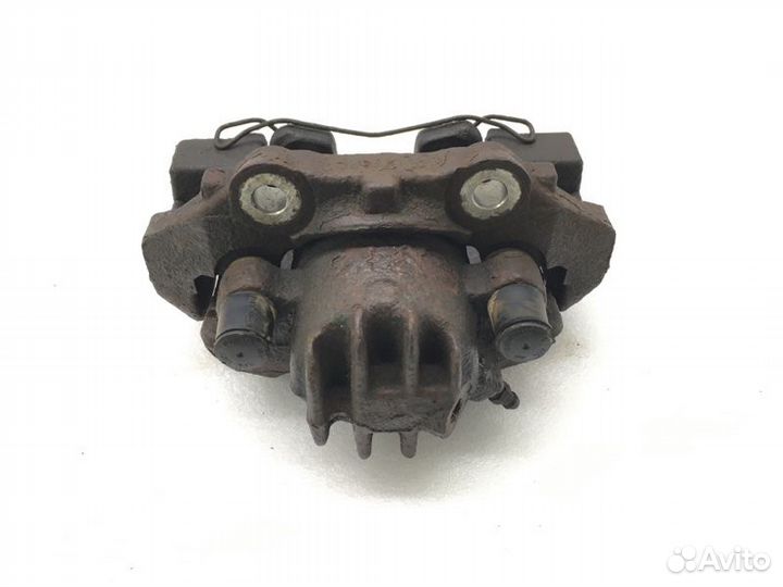 Суппорт тормозной передний левый Peugeot Partner