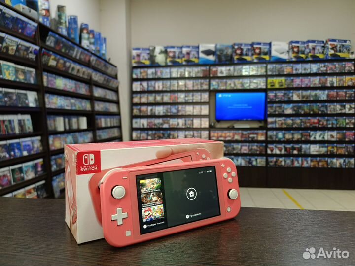 Nintendo Switch Lite Coral 32gb + 128 gb