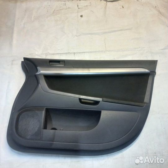 Обшивка двери передняя правая Mitsubichi Lancer 10