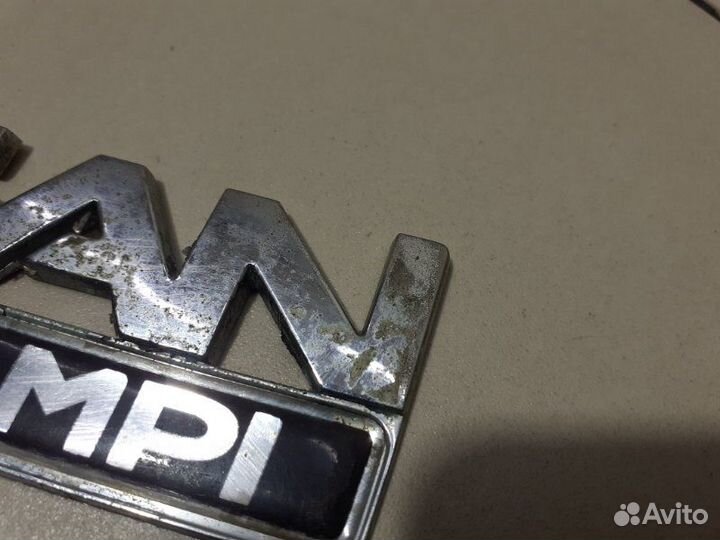 Эмблема на крышку багажника Renault Logan 1