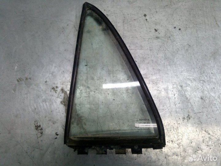 Стекло двери заднее левое Toyota Corolla E12 1.4