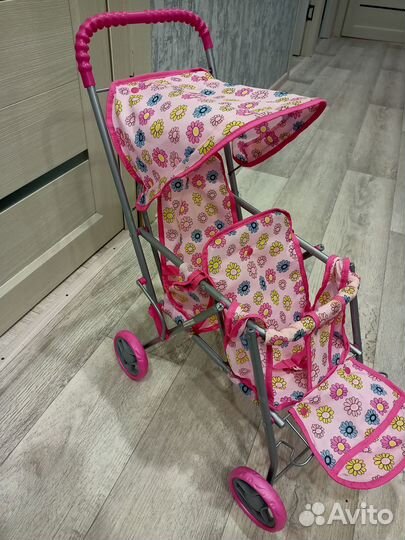 Игрушечная коляска для кукол