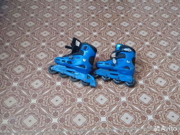 Роликовые коньки