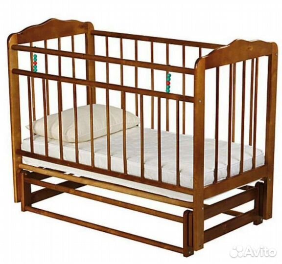 Детская кроватка с маятником